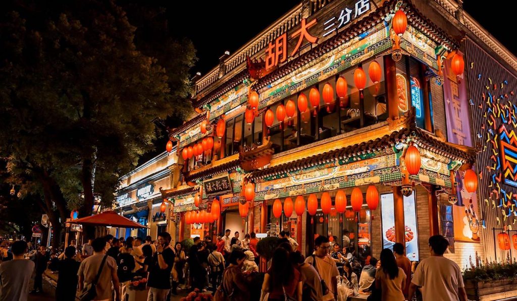 Beijing night market - guijie Crowded Beijing night market with red lanterns and street food vendors at night