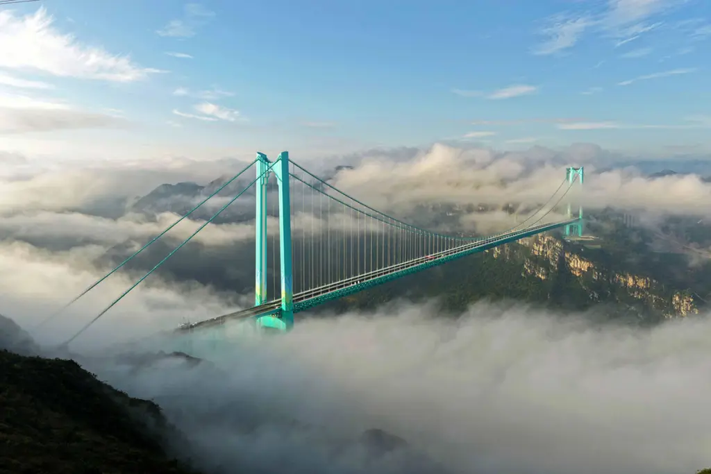 Newly completed Huajiang Bridge China, Canyon Bridge, crossing the Beipan River gorge in Guizhou, China—world's highest bridge at 625 meters