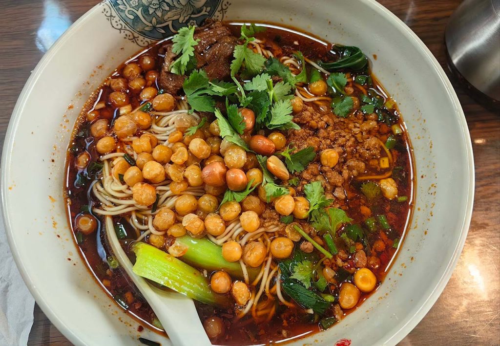 Chongqing xiao mian spicy breakfast noodles in red chili oil broth