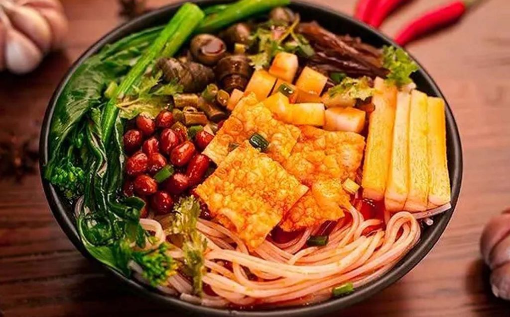 Liuzhou luosifen rice noodles with pickled bamboo shoots and snail broth