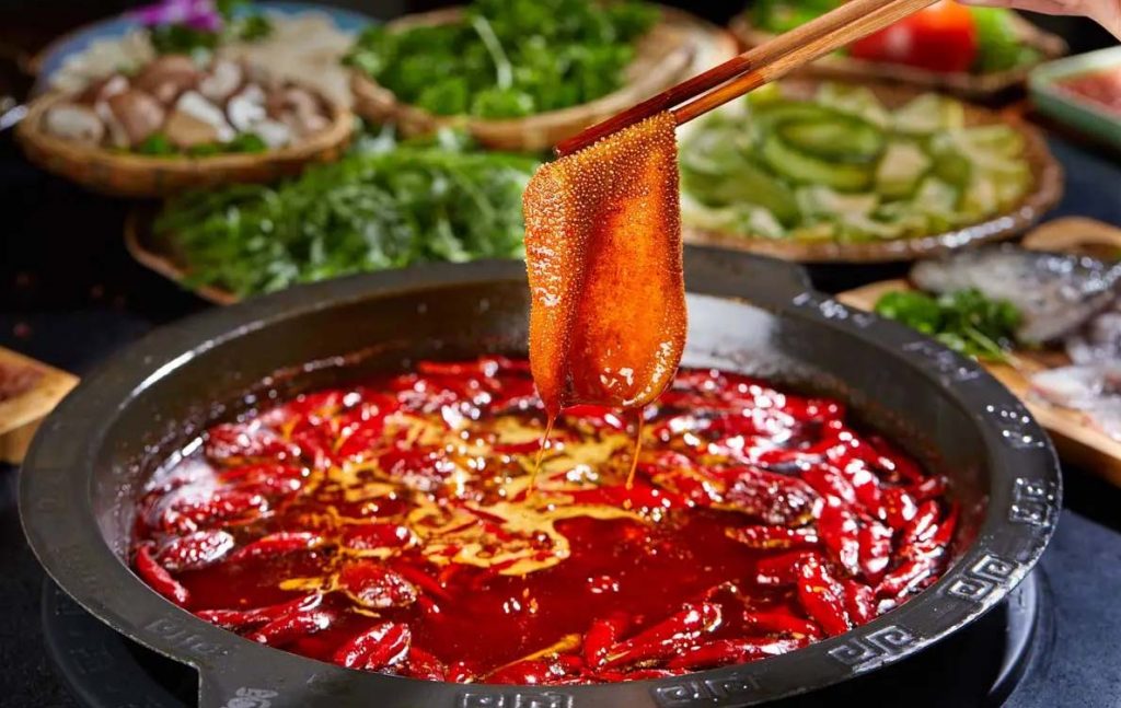 Sichuan cuisine hot pot with spicy mala broth traditional Chinese regional food